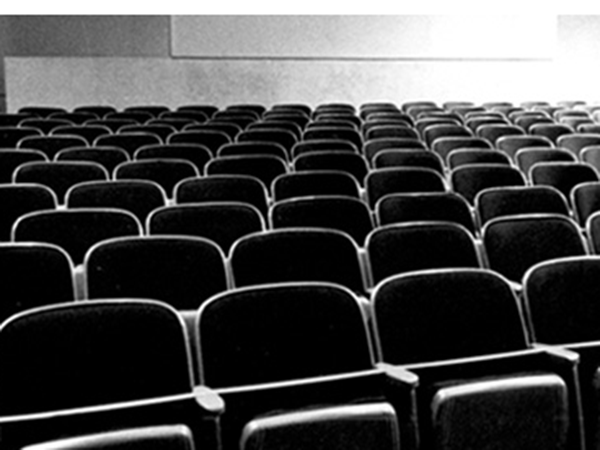 Image of movie theater seats. Image links to event page.