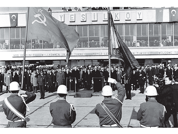Soviet soldiers with USSR flags in Istanbul in 1966. Image links to event page.