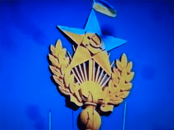 Image of star with hammer and sickle in the color of the Ukrainian flag. Image links to event page.