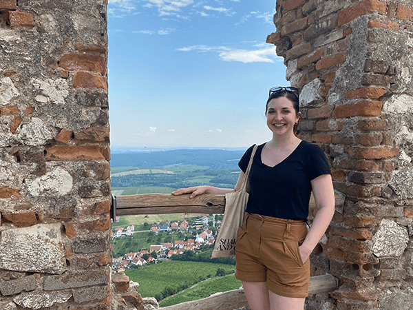 Photo of Helinek hiking in southern Moravia this summer during her Summer Language Fellowship. Leads to a student spotlight interview.