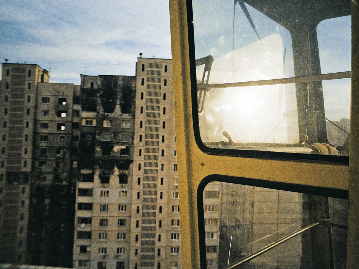 Photo of burnt down and bombed buildings, as seen from a construction crane.